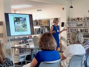 Photo of a Rutgers Master Gardener giving a talk on gardening as part of the Speakers Bureau.